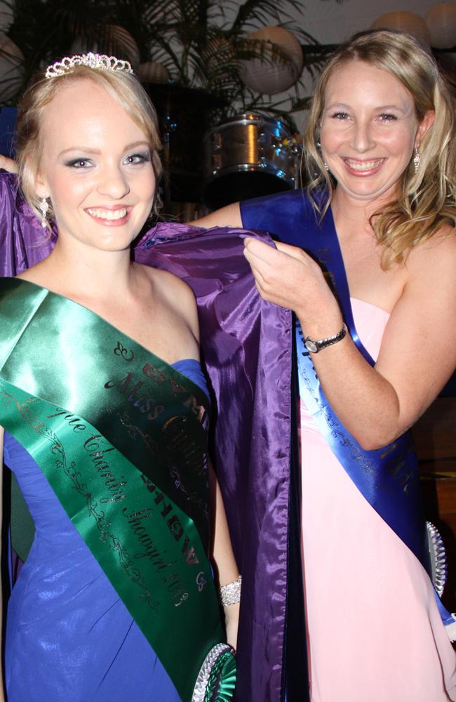 2013 Show girl Kellie Gear with receiving her sash and cape from 2012 Show girl.