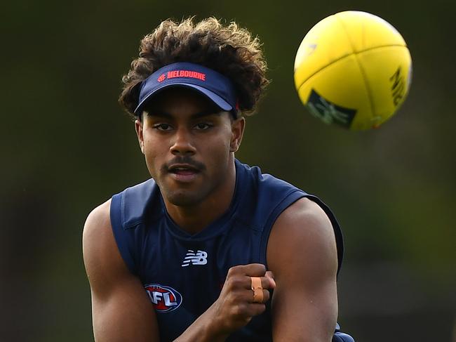 MELBOURNE, AUSTRALIA - MARCH 15: Kysaiah Pickett of the Demons handballs during a Melbourne Demons AFL training session at Casey Fields on March 15, 2021 in Melbourne, Australia. (Photo by Quinn Rooney/Getty Images)