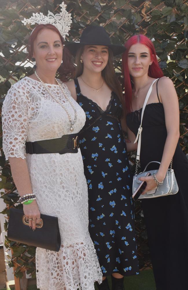 Kate Miles, Emmerson Broomhall and Marley Wyatte at the Yeppoon Turf Club's Derby Day races at Keppel Park Racecourse on November 2, 2024.