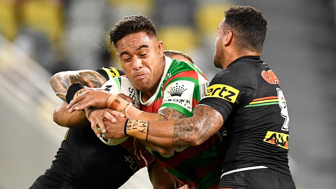 TOWNSVILLE, AUSTRALIA - SEPTEMBER 11: Tevita Tatola of the Rabbitohs is tackled during the NRL Qualifying Final match between Penrith Panthers and South Sydney Rabbitohs at QCB Stadium, on September 11, 2021, in Townsville, Australia. (Photo by Ian Hitchcock/Getty Images)