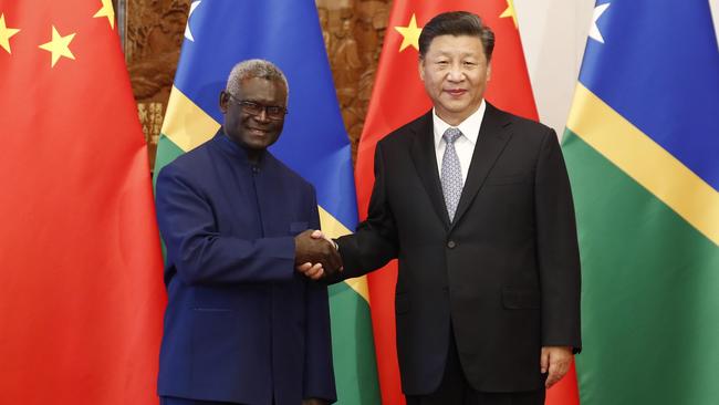 Chinese President Xi Jinping shakes hands with Prime Minister Manasseh Sogavare of the Solomon Islands in 2019. Picture: Getty Images