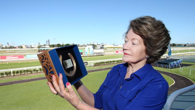 Pictured at the Gold Coast Turf Club. Leading Race horse trainer Helen Page with her Hall of Fame Trophie her and Her husband John were awarded with. Picture: Mike Batterham