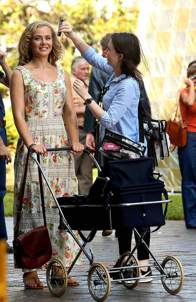 Marais getting a touch-up from a make-up artist before filming. Picture: Kristi Miller