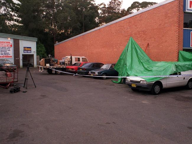 Police at the scene of the 1999 Rebels clubhouse shooting, which has never been solved