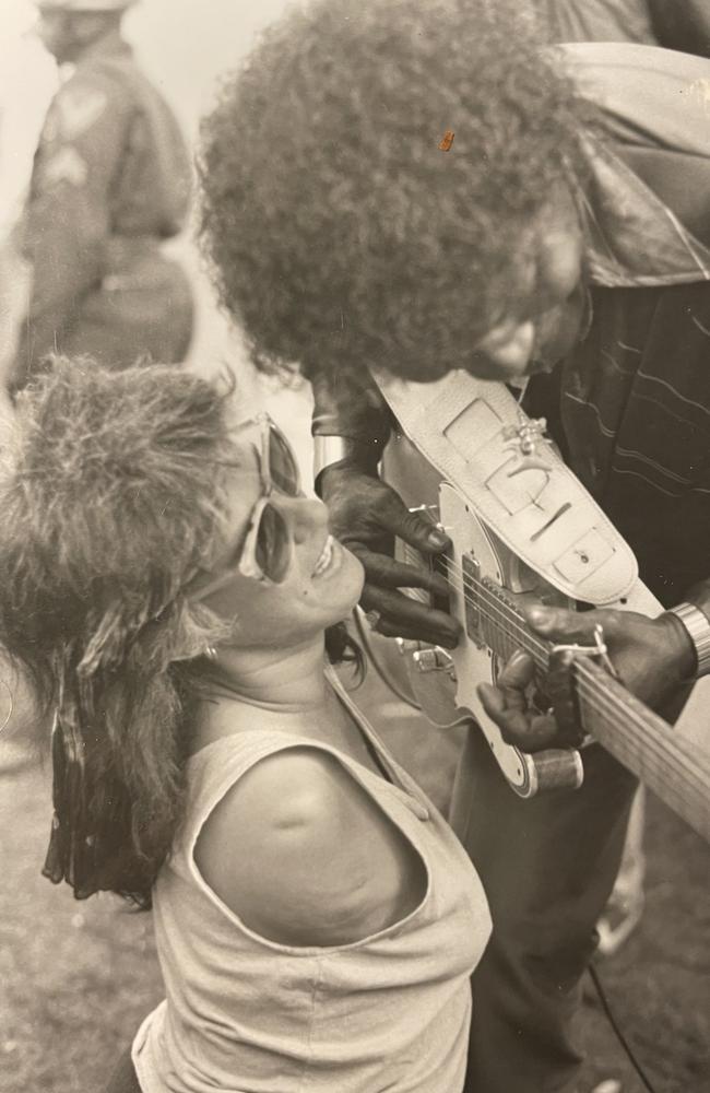 Deb Gray with famous blues guitarist Albert Collins in San Francisco in 1980s. Picture: Supplied