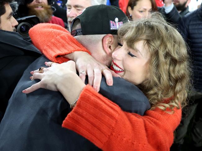 BALTIMORE, MARYLAND - JANUARY 28: Travis Kelce #87 of the Kansas City Chiefs celebrates with Taylor Swift after a 17-10 victory against the Baltimore Ravens in the AFC Championship Game at M&T Bank Stadium on January 28, 2024 in Baltimore, Maryland. (Photo by Rob Carr/Getty Images)