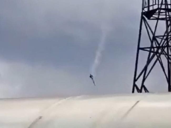 This video grab taken from the footage posted on a Wagner linked Telegram channel shows a plane falling in the sky near the village of Kuzhenkino, Tver region. Picture: Supplied