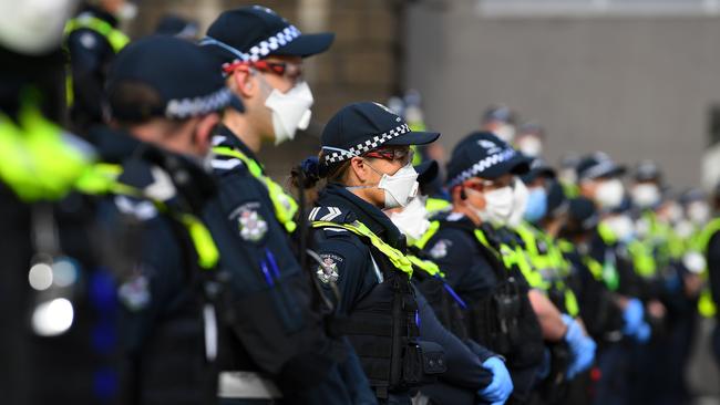 Victoria Police officers stand guard at the Black Lives Matter rally in Melbourne. Picture: AAP