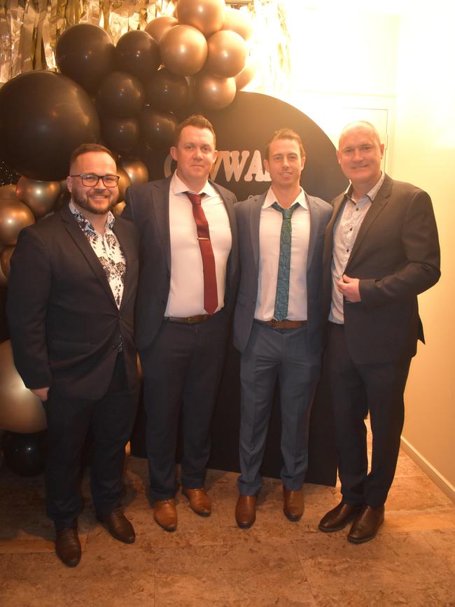 John Burt, Matt Cameron, Sam Scammell and Mick McNulty having a great night at the Cowwarr Saints Football &amp; Netball Club Golden Gala Ball 2024. Picture: Jack Colantuono