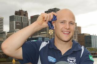 Gary Ablett Jr with his 2009 Brownlow Medal on the banks of the Yarra River, Melbourne. Picture: Nicole Garmston