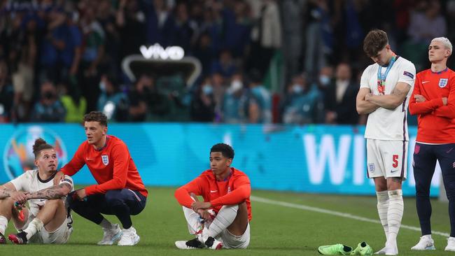 Dejected English players look on. Picture: AFP Photo