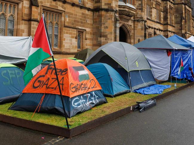 SYDNEY, AUSTRALIA - NewsWire Photos May 3, 2024: Pro-Palestinian rally and tent city at Sydney University today. Tents with graffiti saying free Gaza and from the river to the sea. Picture: NCA NewsWire / David Swift