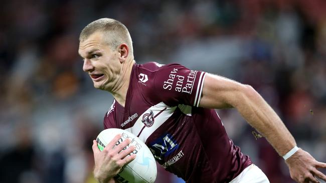 BRISBANE, AUSTRALIA - JULY 24: Tom Trbojevic of the Sea Eagles runs in for a try during the round 19 NRL match between the Manly Sea Eagles and the Wests Tigers at Suncorp Stadium, on July 24, 2021, in Brisbane, Australia. (Photo by Jono Searle/Getty Images)