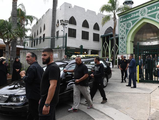 The hearse carrying the coffin of Mahmoud 'Mick' Hawi leaves after his funeral at the Fatima Al-Zahra Masjid. Picture: AAP