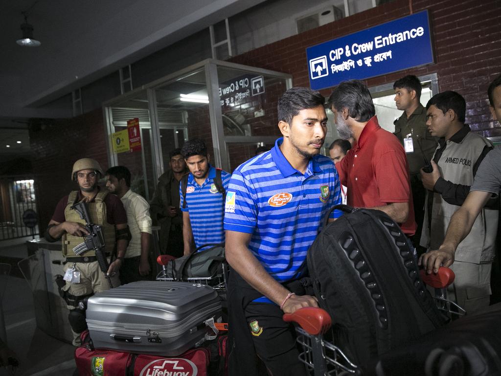  Members of the Bangladesh Cricket team, who were nearly caught up in the attack, arrive at Dhaka from New Zealand. 