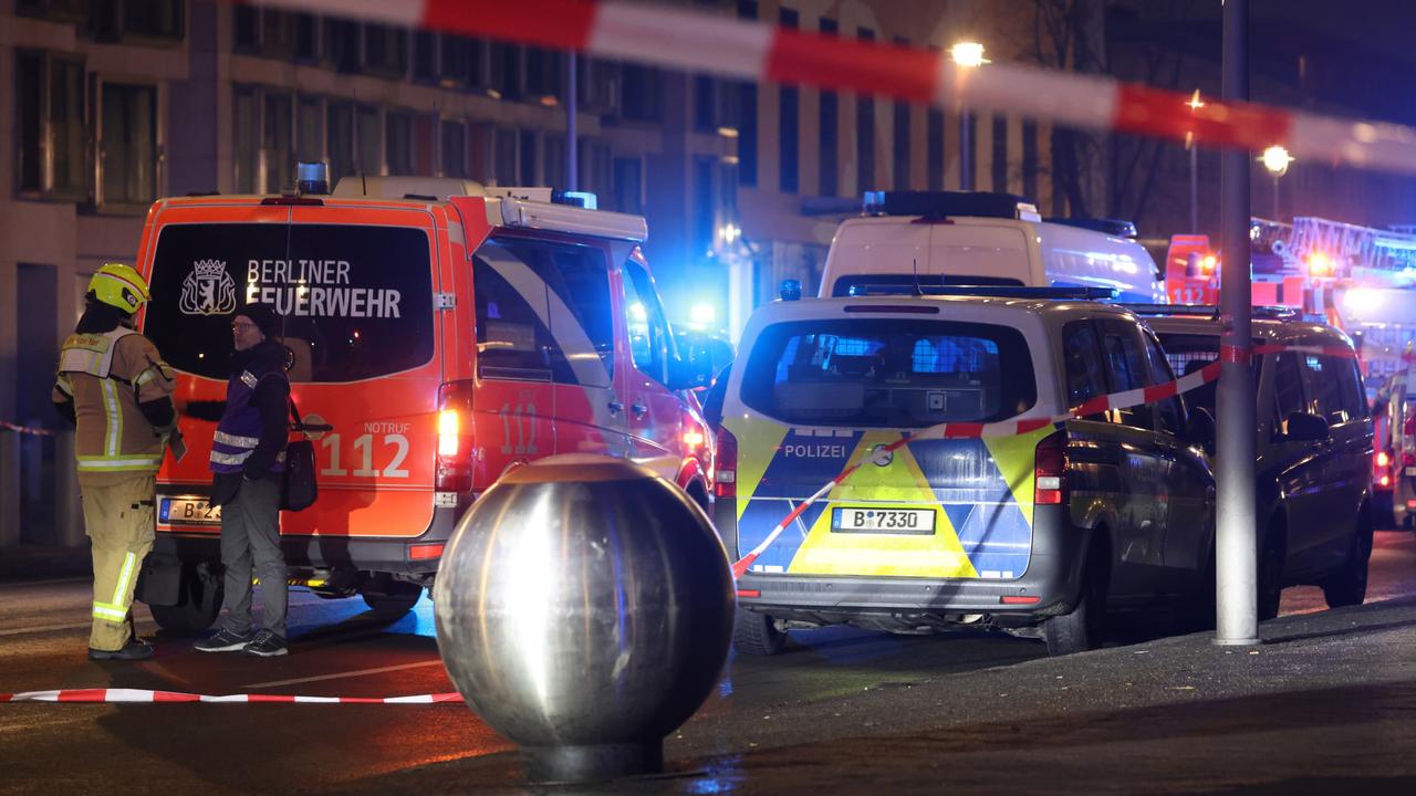 Ambulances park near the US Embassy and crime scene at the Holocaust Memorial in Berlin. Picture: Sean Gallup/Getty Images