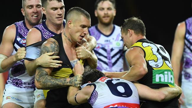 Dustin Martin of the Tigers and Reece Conca of the Dockers scuffle.