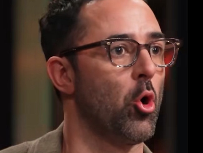 MasterChef judge Andy Allen on TV.
