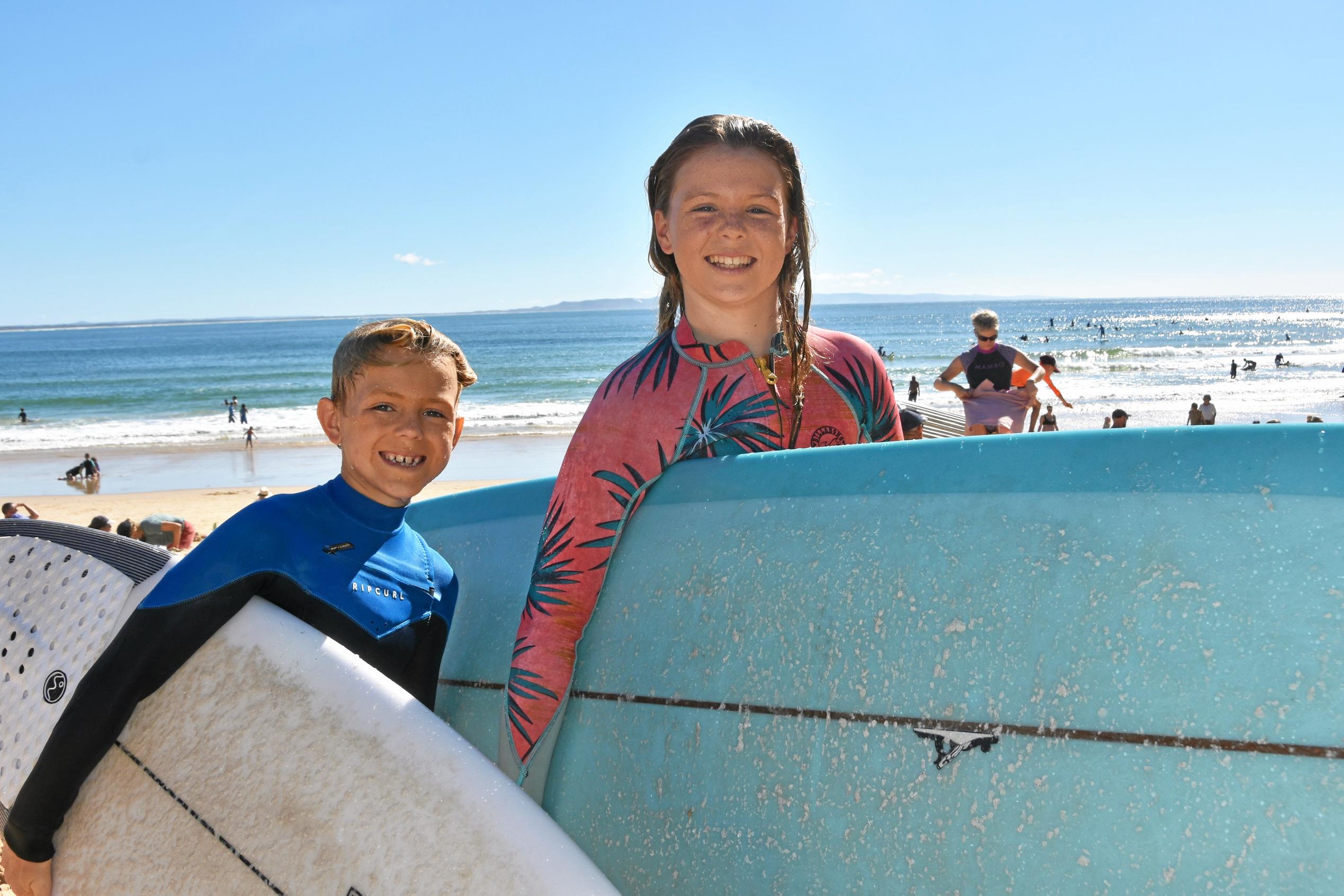 NOOSA HOLIDAYS: Locals Lachlan and Eve Jenner post surf at Noosa Beach. Picture: Caitlin Zerafa