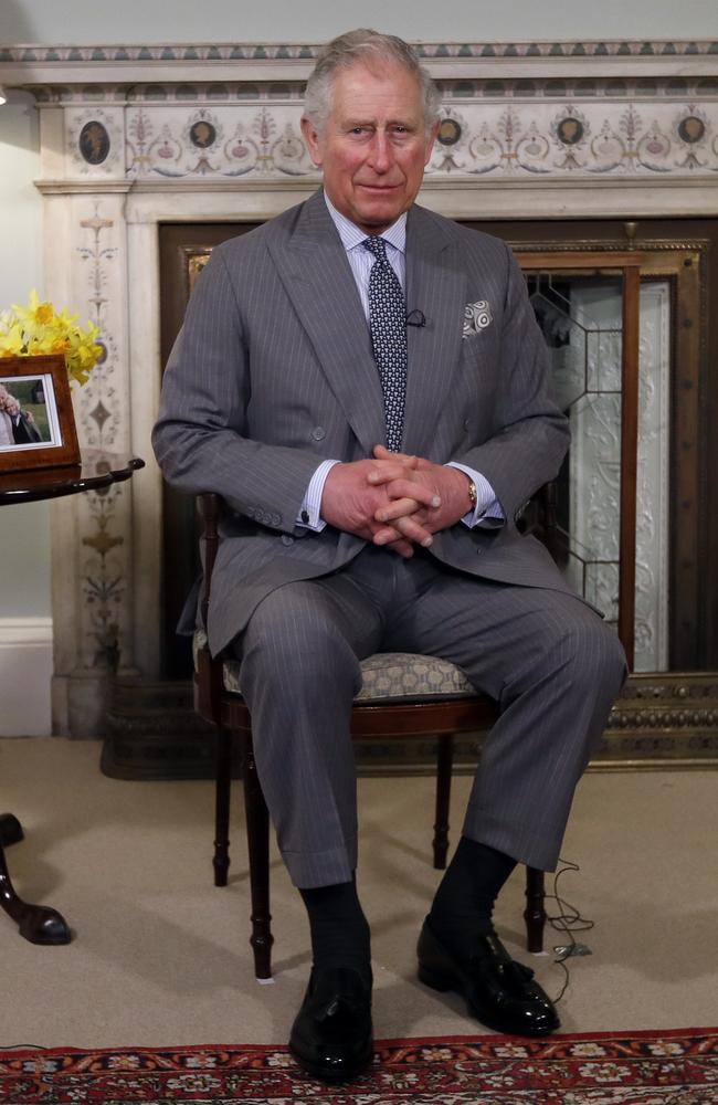 Britain's Prince Charles looks on ahead of delivering his Easter message at Clarence House in London. (AP Photo/Kirsty Wigglesworth)