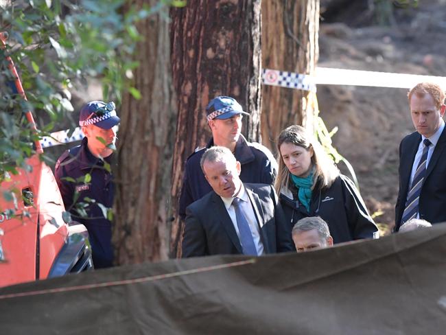 Police and forensics at the site where the remains were found.