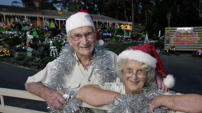 Lobethal couple Peg and Bill Chartres at their home with hundreds of Christmas lights and displays. Picture: Naomi Jellicoe