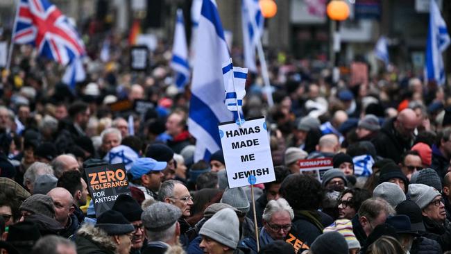 Protesters holding placards take part in a demonstration in central London to protest against anti-Semitism. Picture: AFP