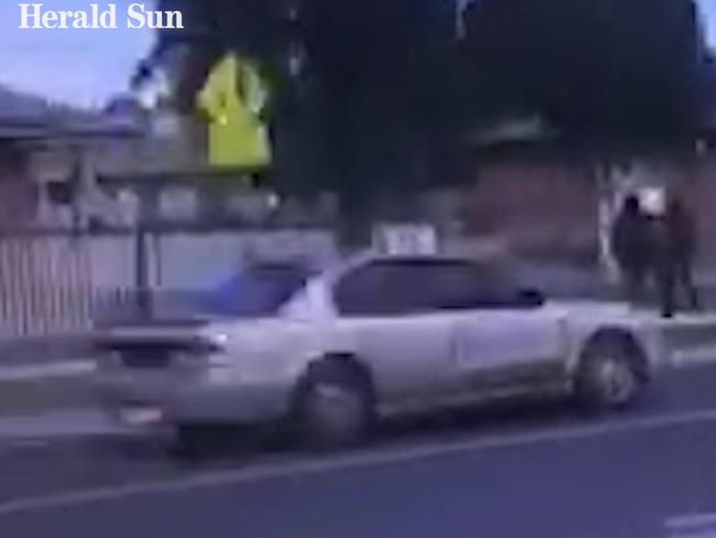 The car was filmed by concerned residents in a school zone.