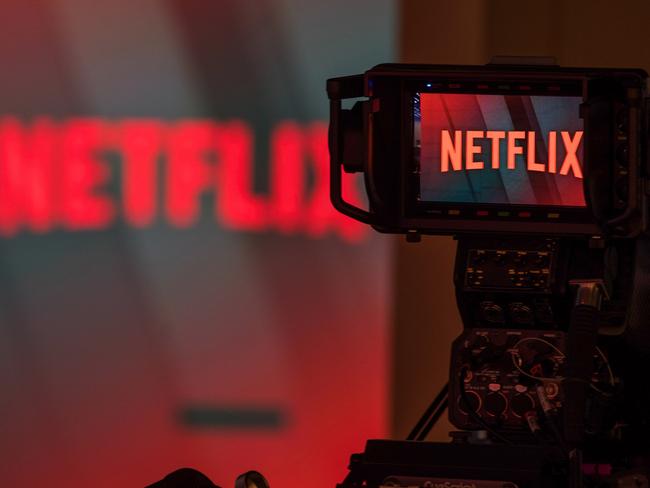 A television camera focuses on the Netflix Inc. company logo in this arranged photograph in London, U.K., on Tuesday, June 26, 2018. Addressing a room filled with New Delhi’s business elite earlier this year, Netflix Inc. Chief Executive Officer Reed Hastings offered a prediction: His company’s next 100 million customers will come from India. Photographer: Chris Ratcliffe/Bloomberg