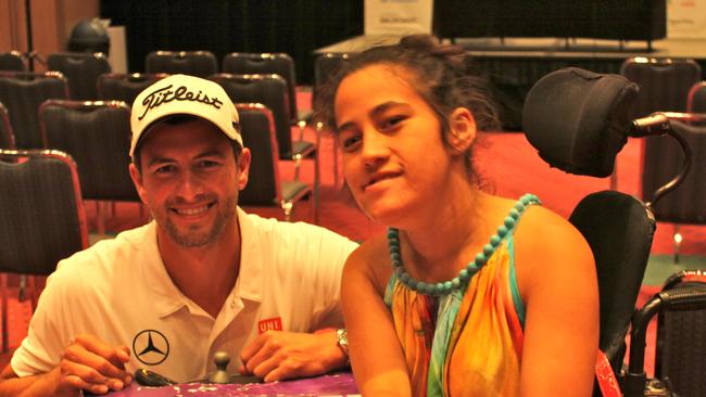 Marlena Katene with golfer Adam Scott.