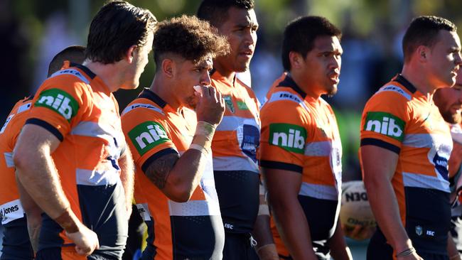 Knights' players look on following a try scored by Jason Nightingale of the Dragons during the round 16 NRL match between the St George Illawarra Dragons and the Newcastle Knights at UOW Jubilee Oval in Sydney on Sunday, June 25, 2017. (AAP Image/Paul Miller) NO ARCHIVING, EDITORIAL USE ONLY