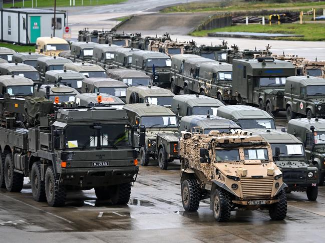 Military vehicles are loaded on to the ship Anvil Point in Marchwood, England as 1,500 UK troops and 600 vehicles join NATO allies for exercises. Picture: Getty Images.