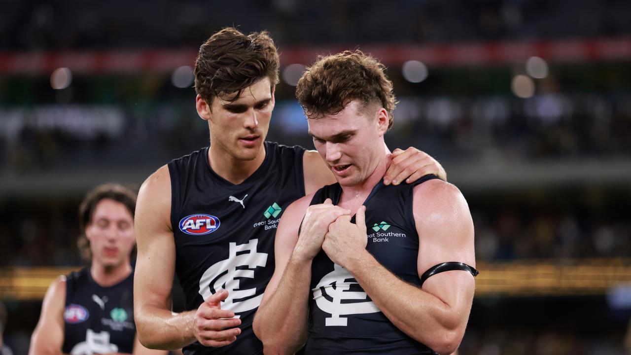 Blake Acres looks dejected after the draw. Picture: Dylan Burns/AFL Photos via Getty Images