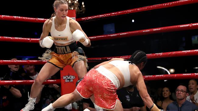 Tayla Harris knocks Connie Chan down. Photo by Kelly Defina/Getty Images.