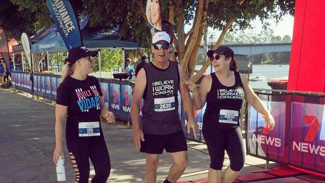 AMAZING FEAT: Trevor Heyes is all smiles after completing the 5km walk at the 7 Rocky River Run with Melissa Mackay (left) and Andrea Mcintosh by his side. Picture: Contributed ROK030719heyes1