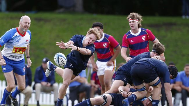 Action from the GPS First XV rugby match between Brisbane Grammar School and Brisbane State High School. GrammarÃ•s Ned Madden passes the ball. Photo:Tertius Pickard