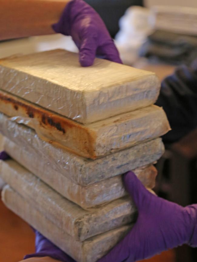 Police allege they found 200kg of MDMA, 80kg of cocaine and nearly $3 million in cash.