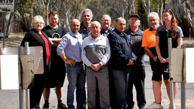 Former councillor Paul Barbaro (third from left) with residents opposed to the closure of Crouch Rd, Golden Grove.