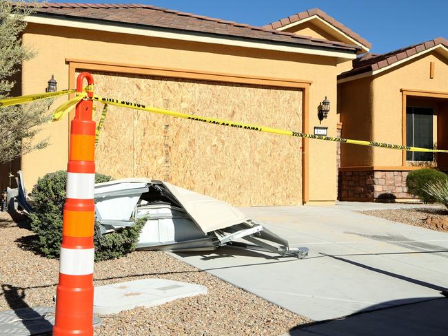 The remains of the garage door sit in the driveway in front of the house in the Sun City Mesquite community where Stephen Paddock lived. Picture: Gabe Ginsberg/Getty Images/AFP