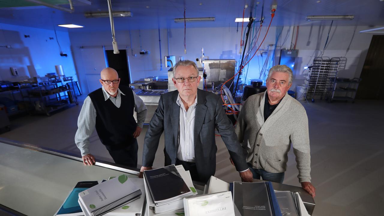 Ian Cook with retired Detective Sergeant Paul Brady [left] and retired Detective Inspector Rod Porter [right], with evidence submitted to Victoria Police.. Picture: Alex Coppel.