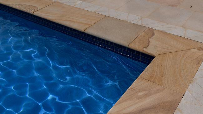 A stock image of a backyard swimming pool at a home in Sydney, Tuesday, October 17, 2017. (AAP Image/Brendan Esposito) NO ARCHIVING