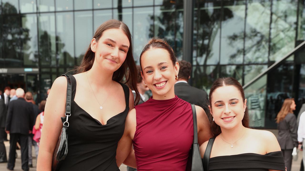 Caitlyn East, Jesslyn Airey and Natasha Millard at the Belmont High School year 12 graduation at GMHBA Stadium. Picture: Alison Wynd