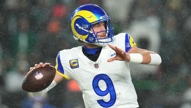 PHILADELPHIA, PENNSYLVANIA - JANUARY 19: Matthew Stafford #9 of the Los Angeles Rams throws a pass against the Philadelphia Eagles during the third quarter in the NFC Divisional Playoff at Lincoln Financial Field on January 19, 2025 in Philadelphia, Pennsylvania. (Photo by Mitchell Leff/Getty Images)