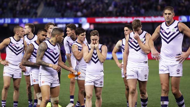 Fremantle trudges off after a disappointing performance against Western Bulldogs.