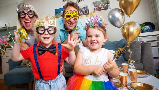 Sarah and Jamie Galbraith celebrate Noon Year’s Eve with their children Lachie and Olivia. Picture: Mark Stewart