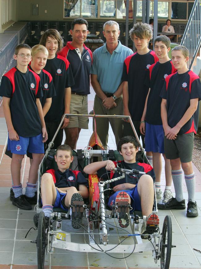 Teachers Mr Brad Pledge and Mr Paul Hand with Aquinas College students before entering a 24 hour challenge in their human-powered vehicle in 2009.