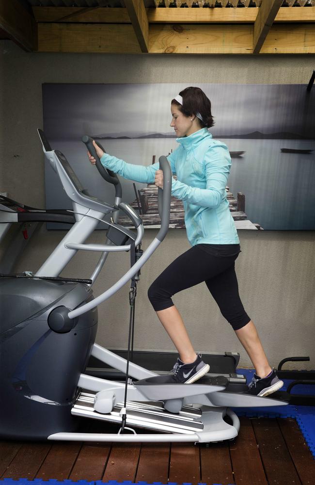 Keeping fit ... Payne hits the treadmill as part of her exercise regime. Picture: Andrew Tauber