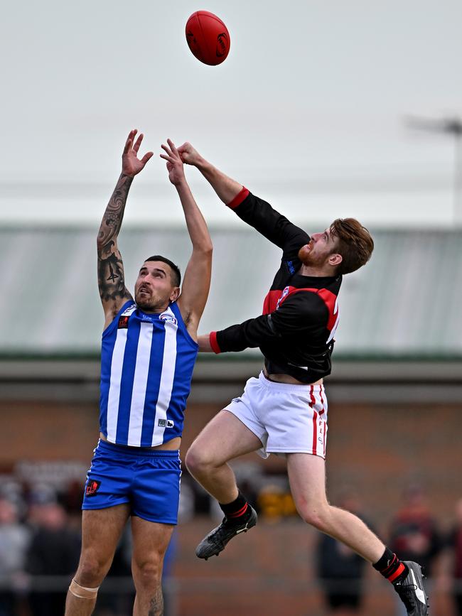 WRFL: Albanvale’s Nathan Calleja is spoiled by Braybrook’s Matthew Grundy. Picture: Andy Brownbill