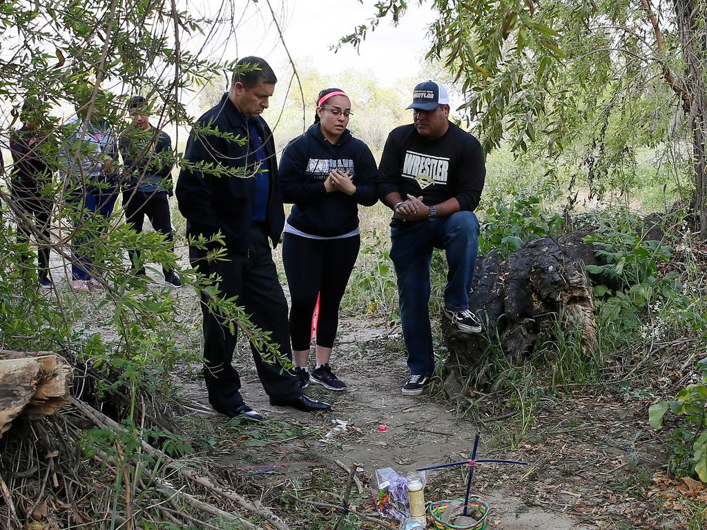 Wrestling coach Ray Castellanos, at the site, Jeremy Sanchez, 17, was fatally stabbed by a teenage friend. (AP Photo/Damian Dovarganes)