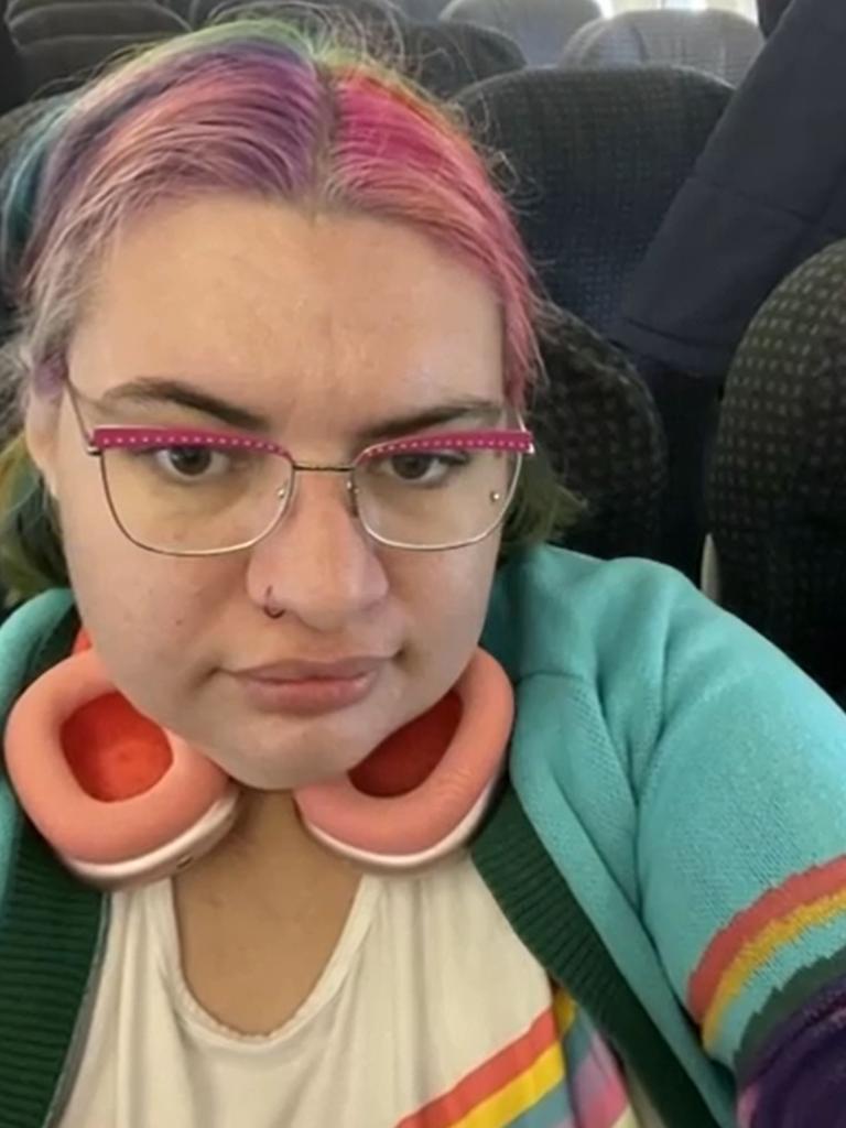 Nikita Bennett had to crawl to her seat after being dropped from her wheelchair while boarding a flight on Tuesday. Picture: 7 News